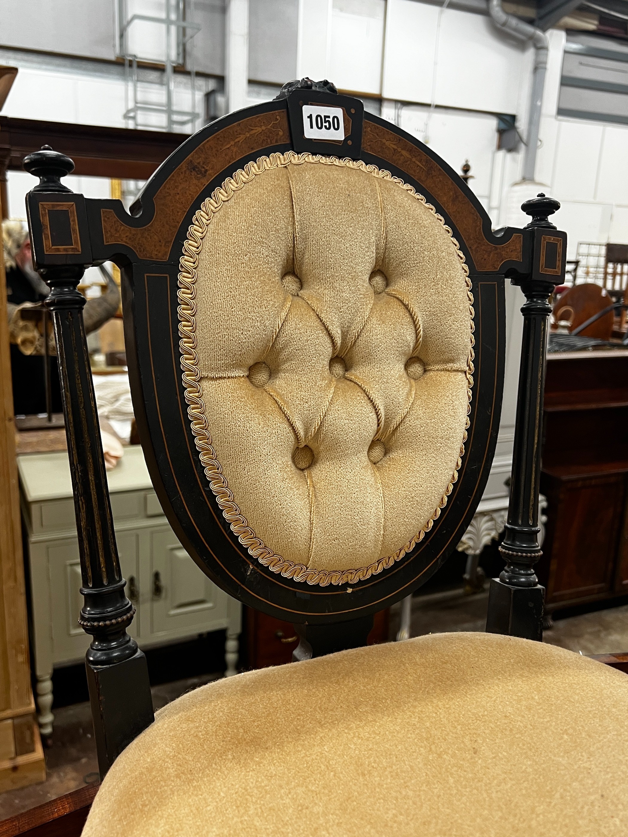 A pair of late Victorian ebonised side chairs